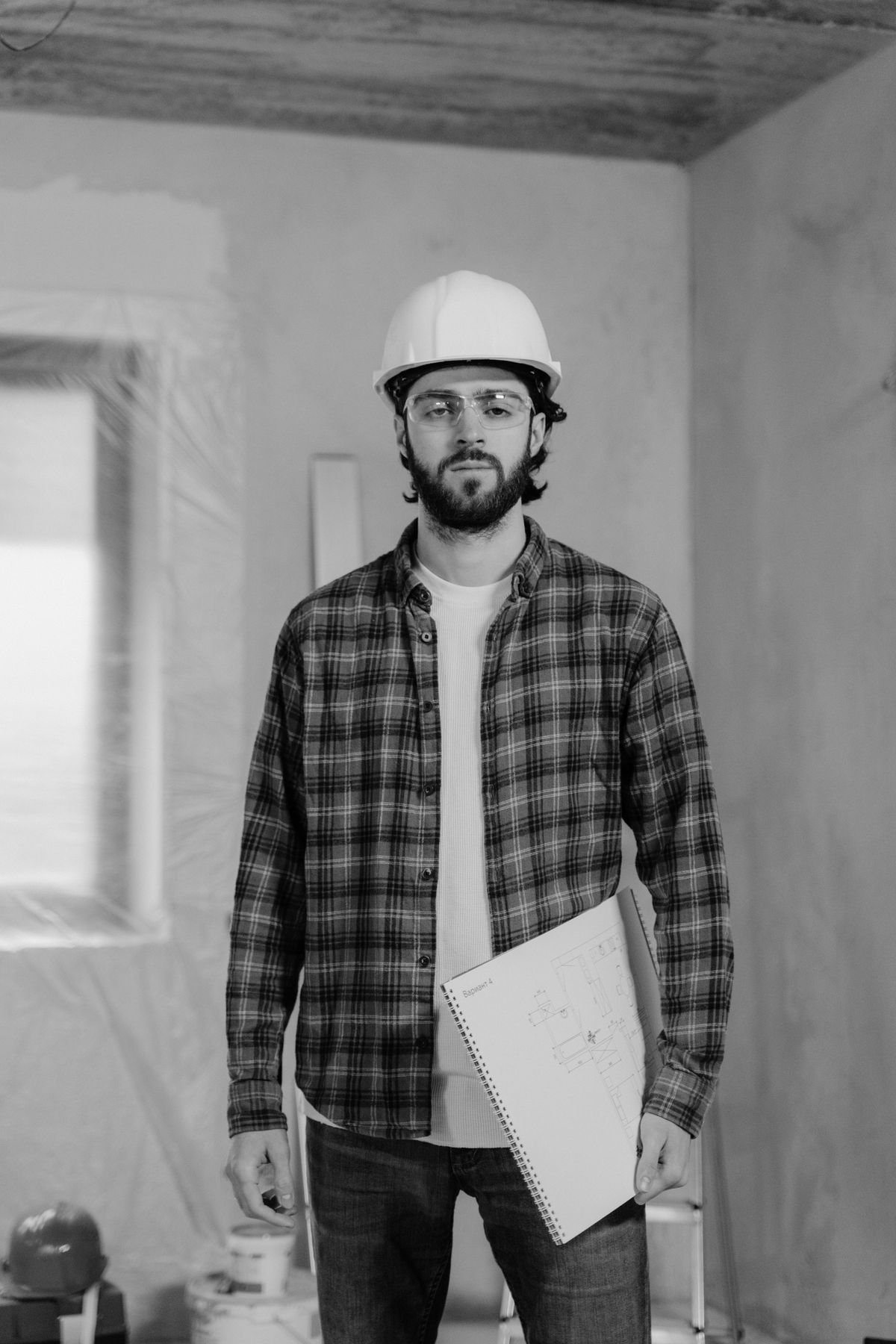 Engineer inspecting construction quality on site